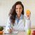 attractive-european-nutrition-adviser-holding-oran-2025-03-18-18-13-04-utc.jpg